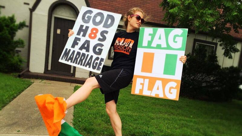 Westboro Baptist Church has posted pictures of members kicking the tricolour after the same-sex marriage vote 
