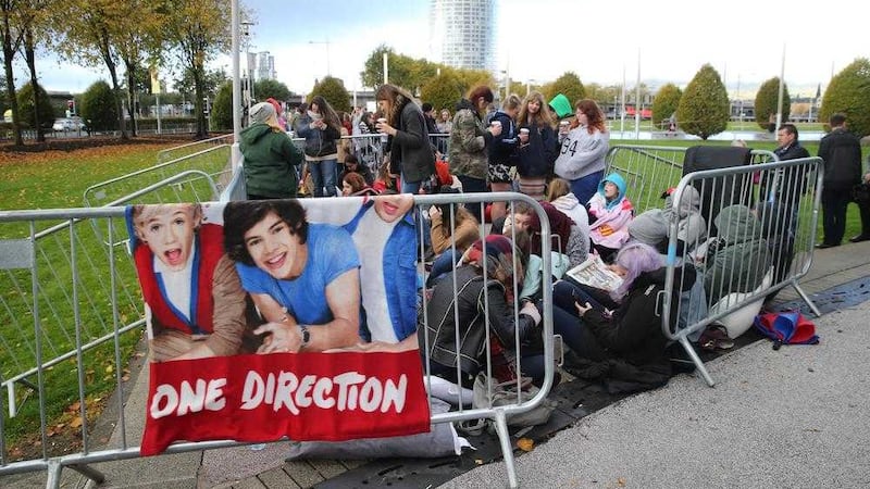 One Direction fans queuing outside the SSE Arena, Belfast on Wednesday were delighted the gigs were going ahead. Picture by Hugh Russell