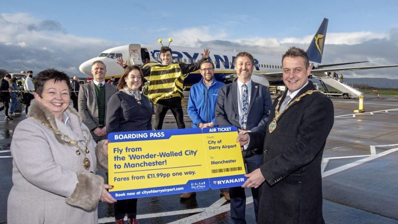 Derry Chamber president Dawn McLaughlin and Alderman Graham Warke (front) welcome Ryanair back to City of Derry Airport, with (back L-R) Ciaran Doherty (Tourism NI), Brenda Morgan (CoDA), Chris Morgan, Frazer McKinstry (Ryanair) and Steve Frazer (CoDA). Picture by Martin McKeown. 