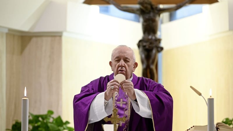 Pope Francis, pictured celebrating Mass at his Santa Marta residence, delivered an extraordinary Urbi et Orbi blessing on Friday. Picture by Vatican News via AP 