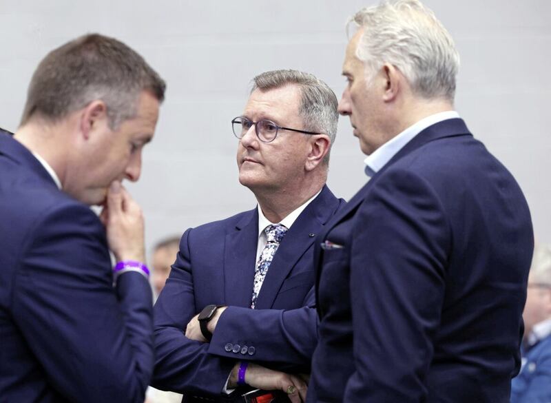 A pensive DUP leader Jeffrey Donaldson with former first minister Paul Givan and North Antrim MP Ian Paisley at the assembly election count in Jordanstown last year. Picture by Stephen Davison
