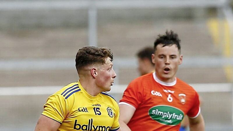 Armagh&#39;s Aaron McKay shadowing Roscommon&#39;s Conor Cox during the Division One relegation play-off. Pic Philip Walsh 