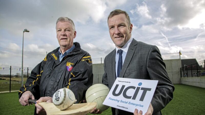The Ulster Community Investment Trust (UCIT) has &lsquo;kicked off&rsquo; a new dedicated &pound;4 million fund for sporting organisations seeking finance. Pictured are Paul Lavery, treasurer of Carryduff GAC with Phelim Sharvin, UCIT&rsquo;s associate director. The club has availed of UCIT finance to help create a new community hub, a ball wall and additional training space. Photo: Brian Thompson 