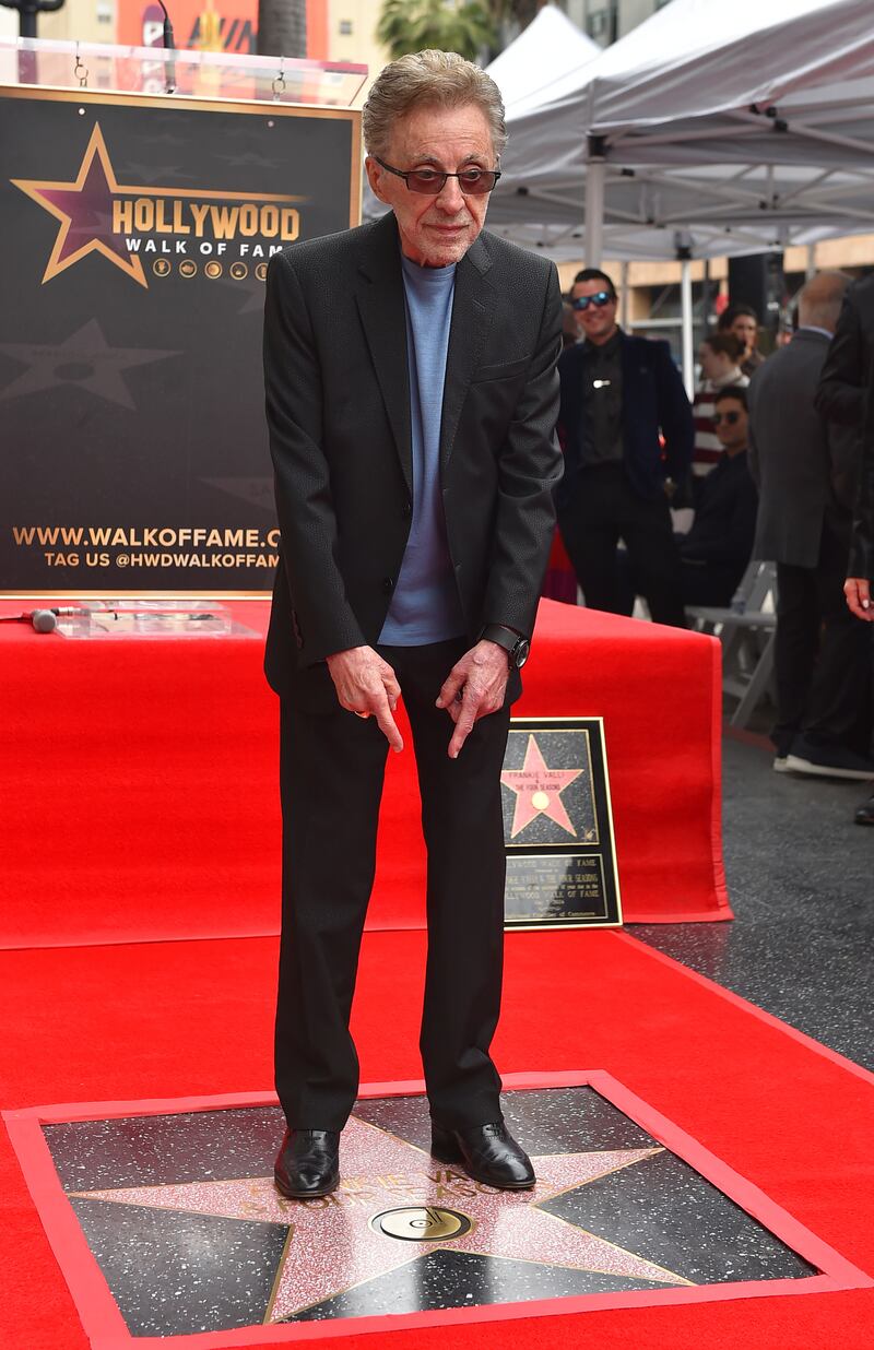 Franki Valli point to his star on the Hollywood Walk of Fame (Jordan Strauss/Invision/AP)