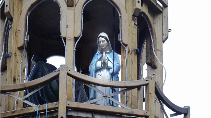 A statue of Our Lady at the &#39;Black Forest Bar&#39; stall, which has been constructed in Belfast city centre. Picture by Hugh Russell 