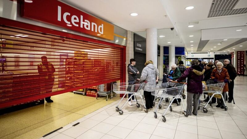 Shoppers waiting for the branch of Iceland in the Kennedy Centre, Belfast, to open. Picture by Liam McBurney/PA Wire. 
