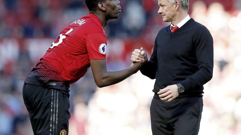 Manchester United manager Ole Gunnar Solskjaer (right) expects Paul Pogba to remain at the club. Picture by Martin Rickett/PA Wire 