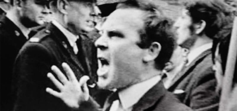 Images of Pat Douglas being struck with a baton during the October 5 march in Derry were flashed around the world. Still from RT&Eacute;&nbsp;