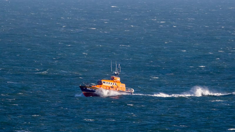 The Coastguard was called and rescued three men