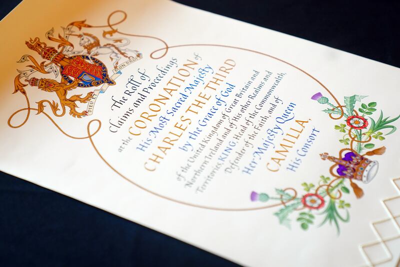 The title page of the coronation roll with artwork by heraldic artist Tim Noad