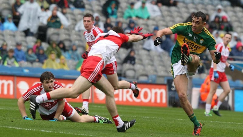 Kerry&#39;s Michael Foley puts the ball past Derry&#39;s Eoghan Concannon during the All-Ireland GAA football minor Championship semi-final in Croke Park Picture by Hugh Russell 