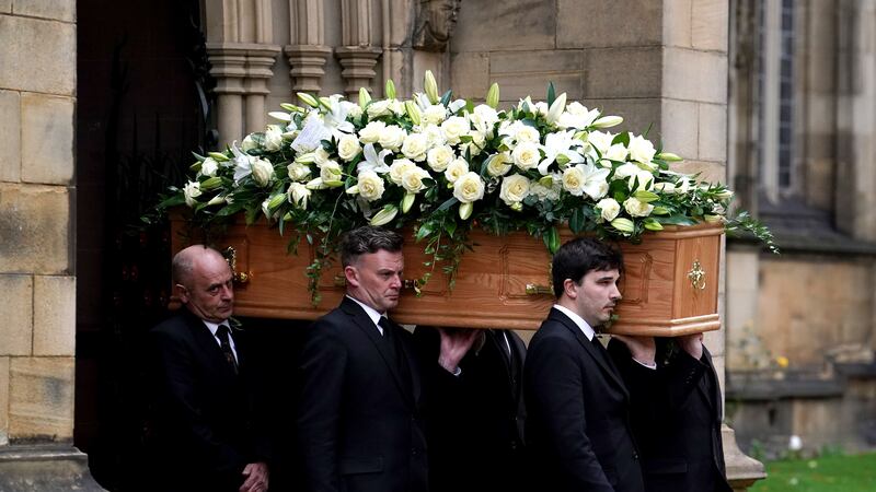 The coffin of Sir Bobby Charlton is carried out of Manchester Cathedral after the funeral service (Martin Rickett/PA)