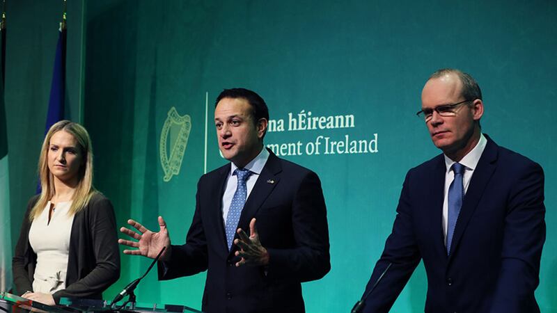 Taoiseach Leo Varadkar (centre), T&aacute;naiste Simon Coveney (right) and Minister for European Affairs Helen McEntee speaking at the Government Press Centre in Dublin after the European Commission announced that &quot;sufficient progress&quot; <br />has been made in the first phase of Brexit talks. Picture by Brian Lawless/PA Wire