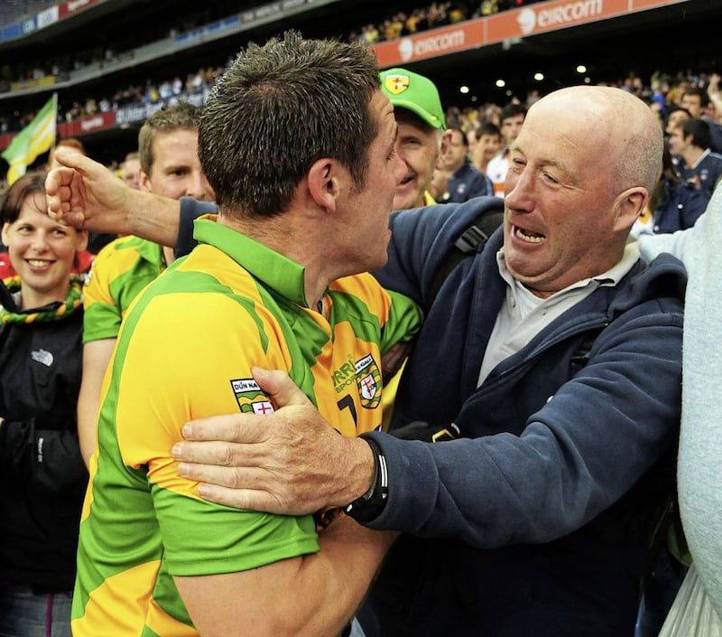 Tom Beag Gillespie celebrates with Kevin Cassidy in Croke Park in 2011 after his famous long range point gave Donegal victory over Kildare. Cassidy had begged Jim McGuinness for a break from Donegal training so that he could go down to Magheragallon with Tom Beag during the week of the game. Photo by Michael O&#39;Donnell 