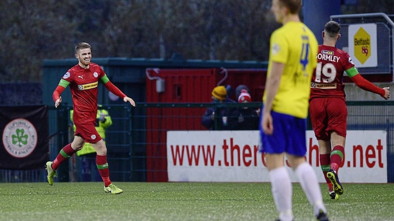 Cliftonville manager Paddy McLaughlin (below) says he was always confident that striker Ruaidhr&iacute; Donnelly (above) would decide to stay put at Solitude 