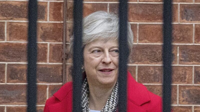 Theresa May leaves from the rear entrance of 10 Downing Street, Westminster, London 