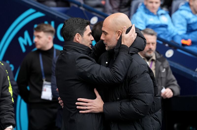 Arsenal manager Mikel Arteta (left) saw his side hold Man City to a goalless draw