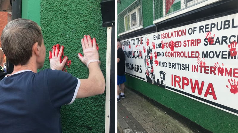 Friends of murdered journalist Lyra McKee used red paint to make handprints on the walls of Saoradh's office in Derry. Pictures by Cate McCurry/PA Wire