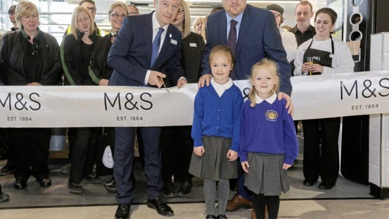 Today Marks &amp; Spencer Aldergrove welcomed customers through its doors for the very first time. The brand new store, located by Belfast International Airport in Antrim, has brought 23 new jobs to the local area. Pictured opening the new store are: Michael Gillen, M&amp;S Aldergrove Store Manager, Tony Young, Principal of Straidhavern Primary School, and pupils Isabel Lyall and Brooke Jones, who won a colouring-in competition to celebrate the opening of the new store.  