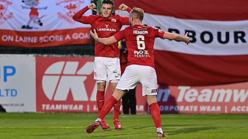 Ronan Hale celebrates scoring his third goal in Larne's 4-2 win over Glentoran in Friday night's European play-off at The Oval<br />Picture: Pacemaker