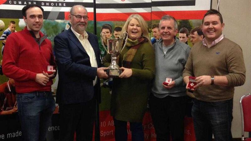 The Sc&oacute;r Sinsear quiz team from St Malachy&rsquo;s, Castledawson won Tr&aacute;th na gCeist for the fourth time in five years at Owenbeg and will represent Derry in the All-Ireland final in Killarney next month. The team of Damien O'Callaghan, Sarah Gribbin, Gerry McElwee and Paul Gribbin are pictured receiving the John McCormack Memorial Cup from Derry chairman Brian Smith
