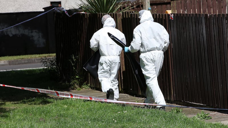 Forensics officers at Moyraverty Court in Craigavon in July 2014. Picture by Ann McManus&nbsp;