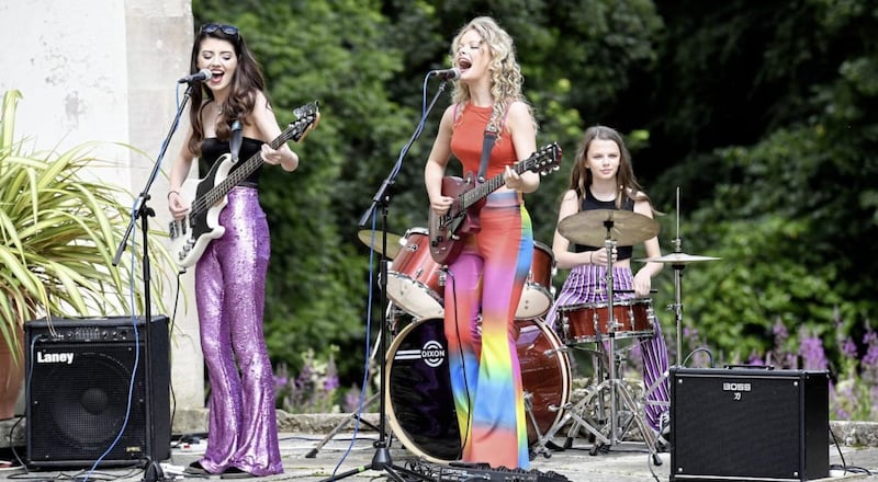 Mollie &amp; Orlaith Forsythe on stage, with Mollie's sister Mamie on drums&nbsp;