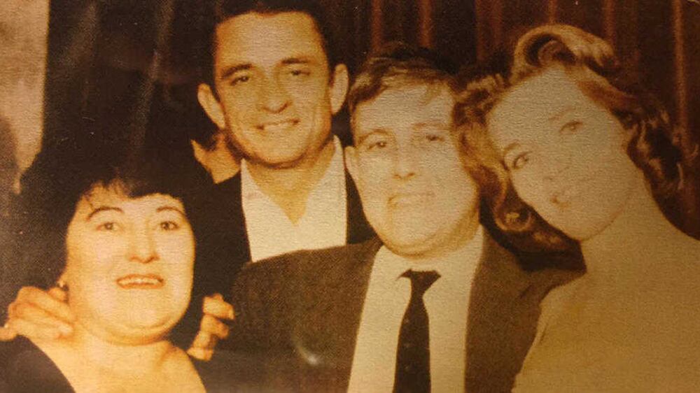 Billy McBurney, centre, with his sister Winnie (left) and Johnny Cash and June Carter Cash 