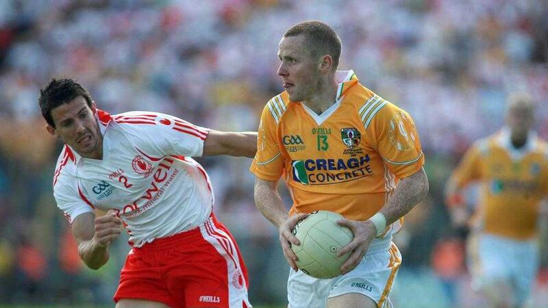 Tyrone's PJ Quinn puts Antrim's Paddy Cunningham under pressure during the 2009 Ulster SFC final<br />Picture by Seamus Loughran