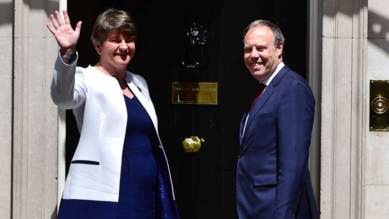 DUP leader Arlene Foster and DUP deputy leader Nigel Dodds arriving at 10 Downing Street in London for talks on a deal to prop up a Tory minority administration&nbsp;