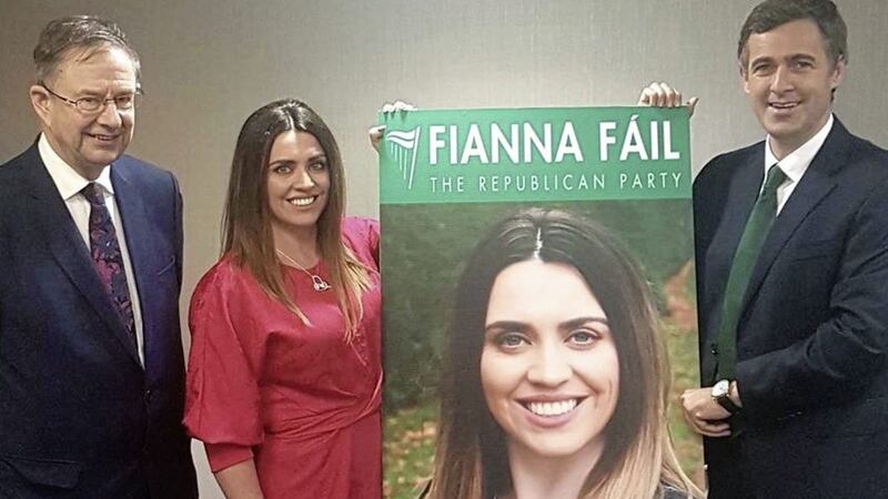 Fianna F&aacute;il TD &Eacute;amon &Oacute; Cu&iacute;v (left) with Sorcha McAnespy with Senator Mark Daly in Omagh on Thursday night 