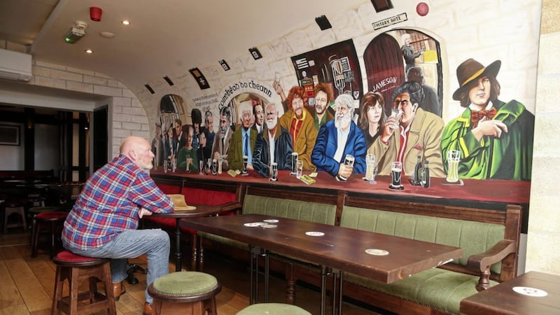 New mural of Irish entertainers upstairs in Kelly&#39;s Cellars is drawing the tourists in Picture Mal McCann. 