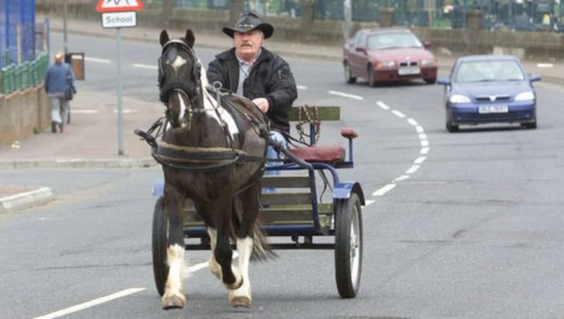 Seamus Conlon was often seen riding his horse and trap along Whiterock Road, close to the spot where he was killed on Saturday. Picture by Sunday Life