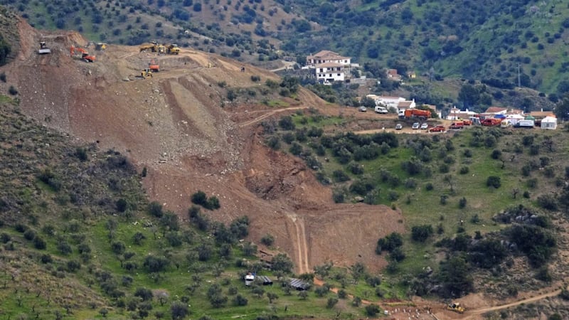 Drill machines and excavating machinery work on top of the mountain next to a deep borehole to reach a two-year-old boy trapped there for six days near the town of Totalan in Malaga Picture by Gregorio Marrero/AP 
