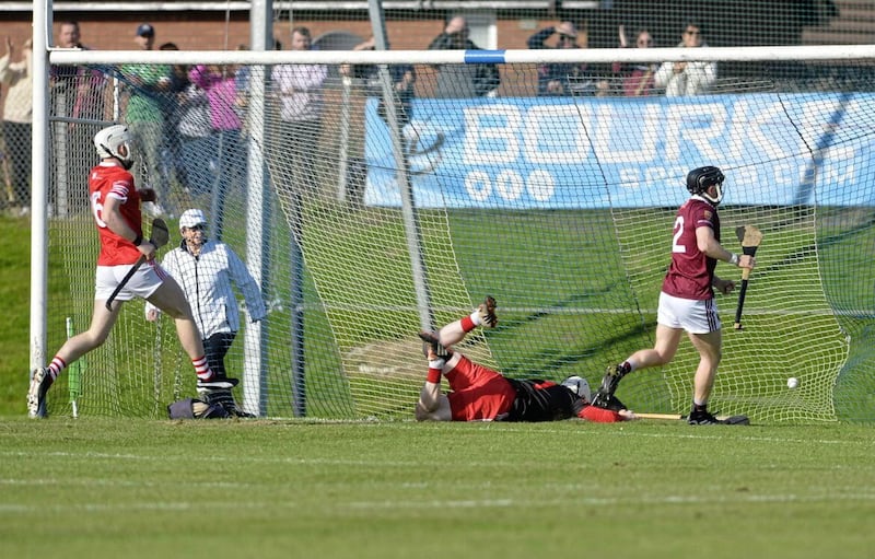 Cushendall&#39;s Fergus McCambridge nets in the county final at Corrigan Park Picture Mark Marlow. 