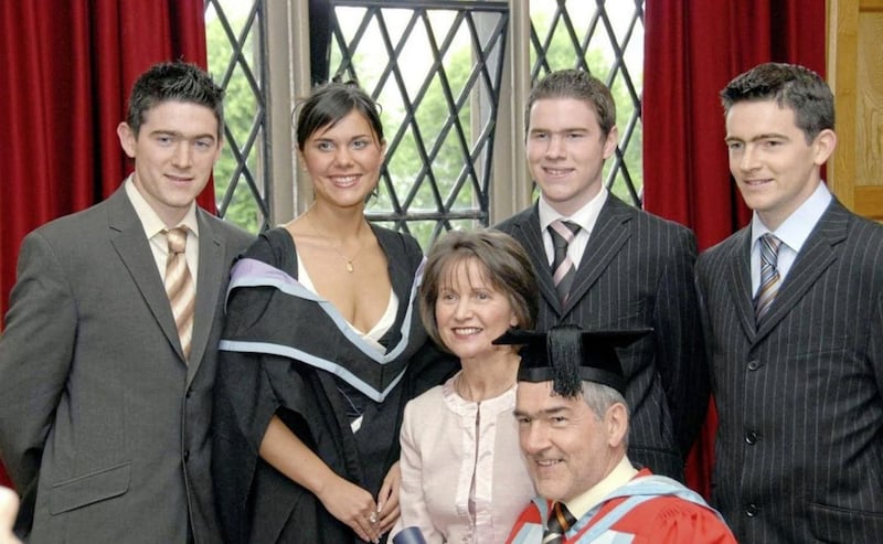 Michael Harte, Michaela Harte, Mattie Harte, and Mark Harte and Mickey Harte, seated, with his wife Marian after the former Tyrone GAA manager received an honorary degree from Queen's University Belfast in 2006. File picture from Press Association