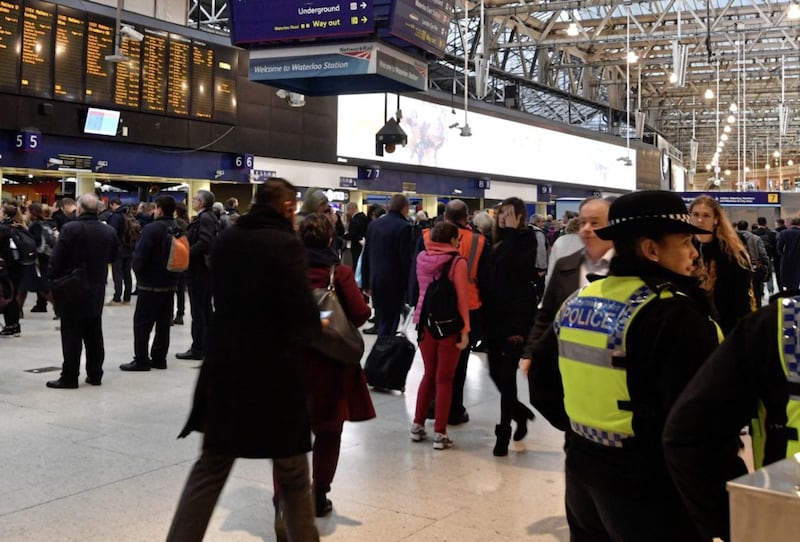 British Transport Police Officers on the concourse of Waterloo Railway Station in London. Picture by John Stillwell, Press Association