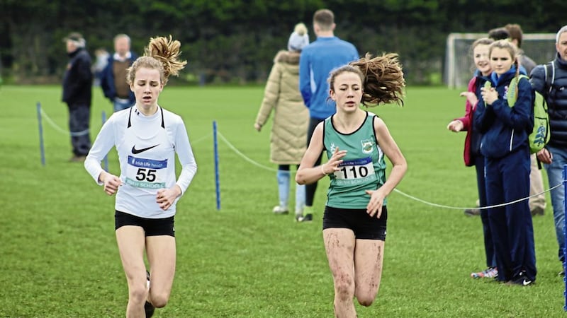 Cara Laverty (right) pipped Victoria Lightbody to the minor girls&rsquo; title at the Irish Schools&rsquo; Cross Country Championships 