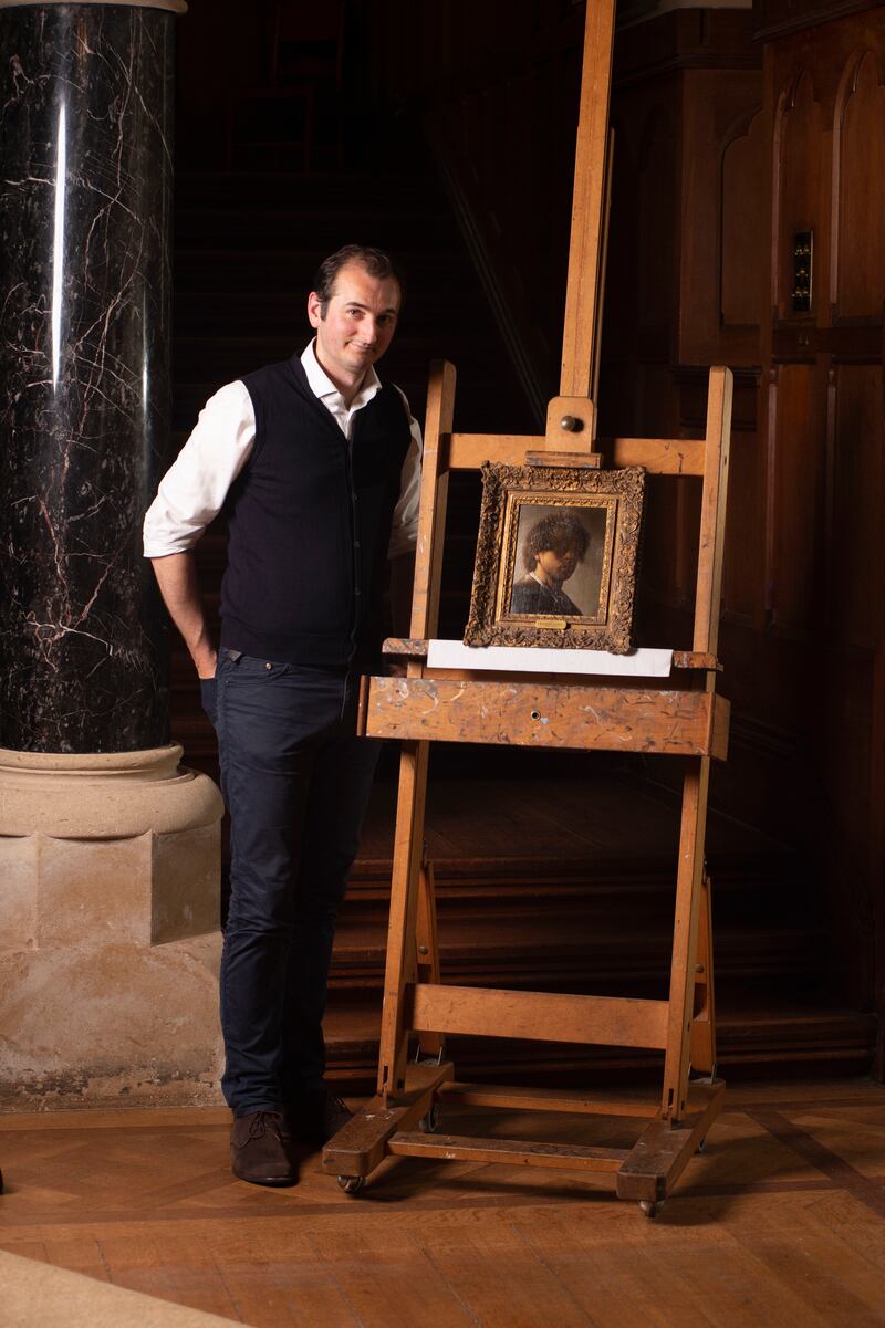 Dr Bendor Grosvenor with a portrait of Rembrandt
