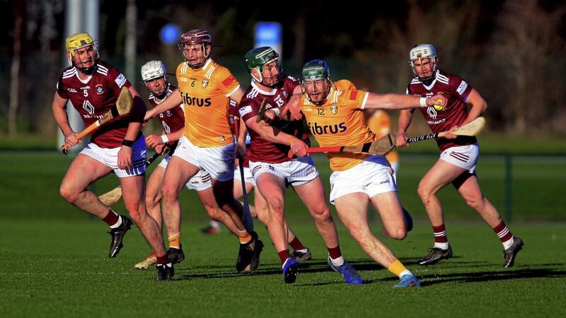 Antrim's  Niall Mc Kenna with  Eoghan Campbell in action against Westmeath's Niall O Brien, Mark Cunningham and Aaron Craig in Saturday's Walsh Cup game in Abbotstown      Picture:  Seamus Loughran