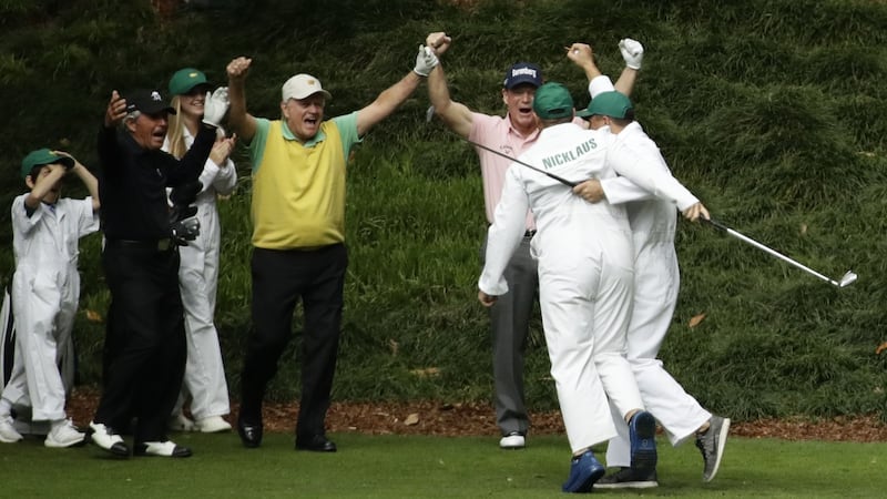 The golfing legend passed his caddie the club for the final hole.