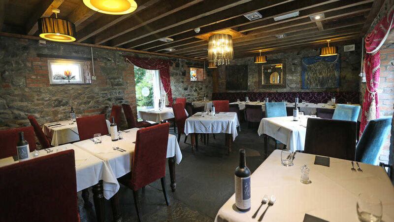The dining room is old-school rustic and deceptively cosy Picture by Hugh Russell 