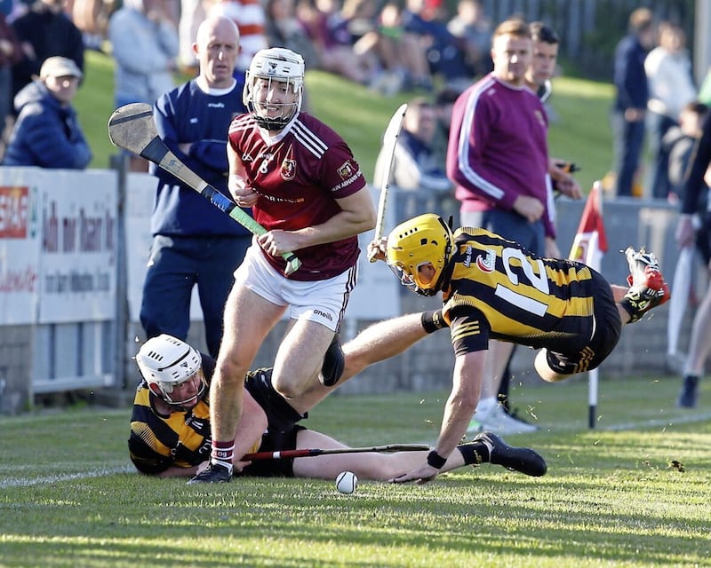 Cushendall&#39;s Francis McCurry and Ballycastle duo Ciaran Butler and Cian Waldron during the sides&#39; championship meeting at the start of August Picture: Philip Walsh 