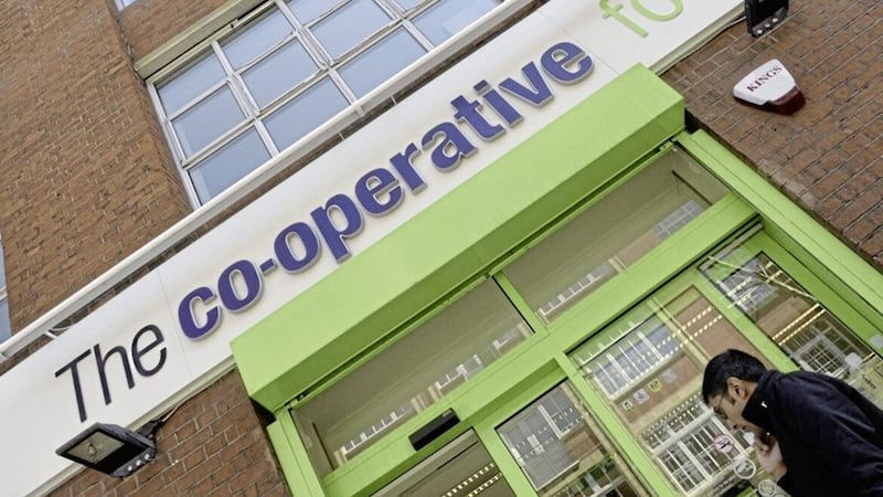 The Co-op Group has offloaded its 129-strong petrol forecourt chain to supermarket giant Asda for &pound;600 million 