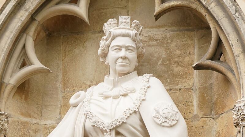 Weighing 1.1 tonnes and made from French limestone, the sculpture shows Elizabeth II in the robes of the Order of the Garter.