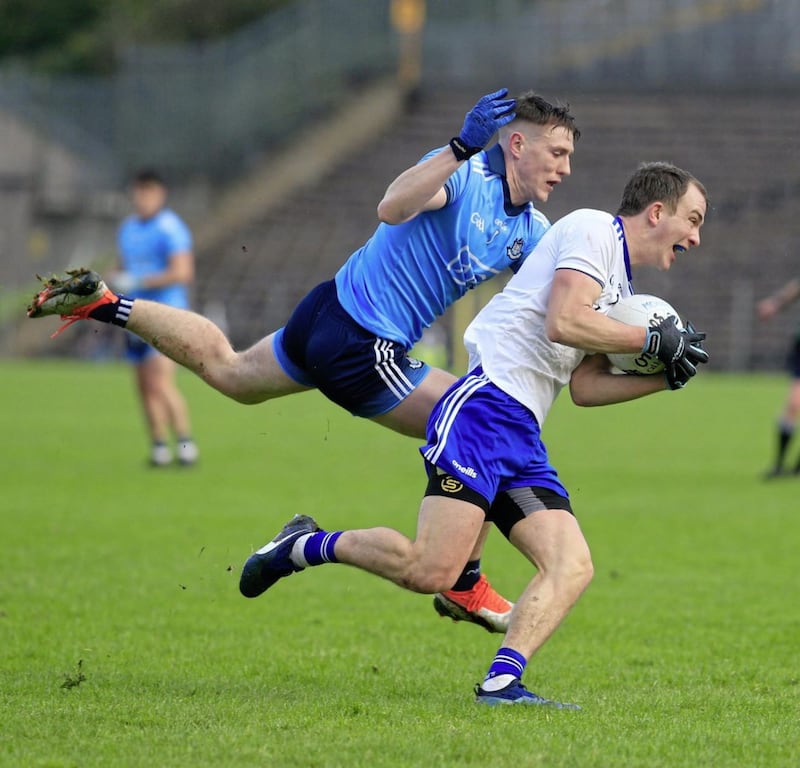 Jack McCarron, pictured with Dublin&#39;s John Small, scored five points for Monaghan yesterday. Pic Philip Walsh. 