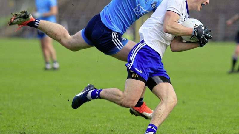 Jack McCarron, pictured with Dublin&#39;s John Small, scored five points for Monaghan yesterday. Pic Philip Walsh. 