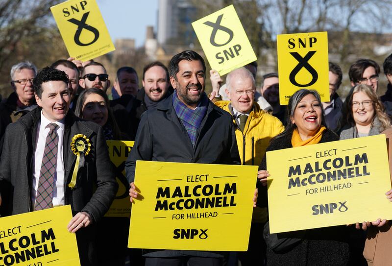 First Minister Humza Yousaf with Westminster candidates, local Hillhead SNP by-election candidate Malcolm McConnell and activists in Kelvingrove Park, Glasgow