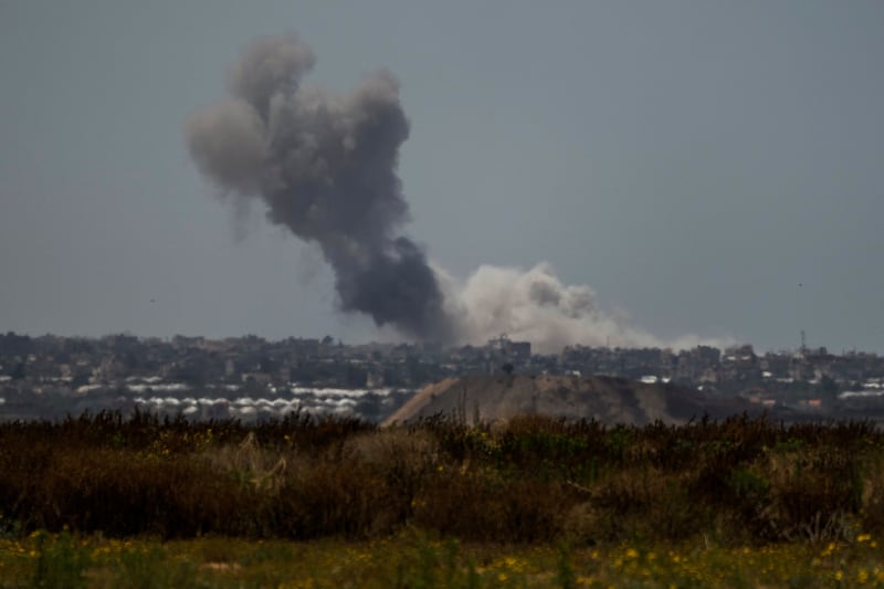 Smoke rises following an Israeli bombardment in the Gaza Strip as seen from southern Israel (Leo Correa/AP)
