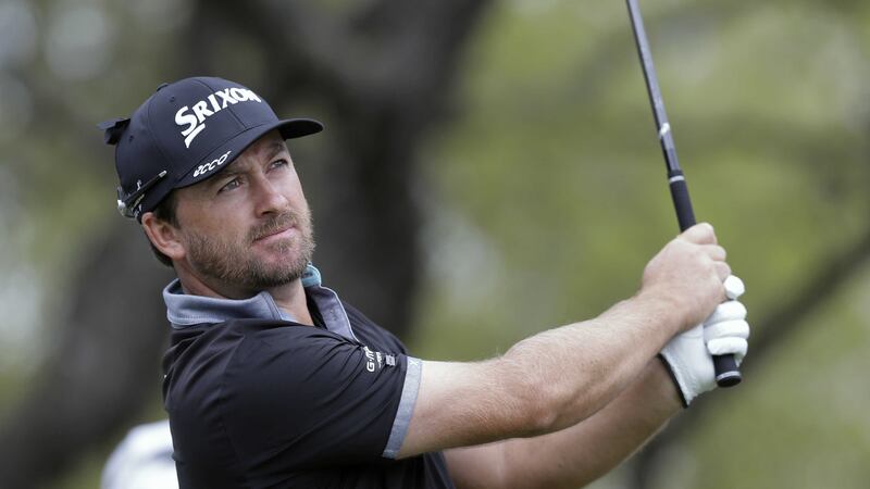 Graeme McDowell watches his tee shot on the first hole during round-robin play against Jason Day at the Dell Match Play Championship at Austin County Club, Texas on Wednesday<br />Picture by AP&nbsp;